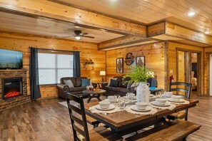 Gather around the fireplace and enjoy the open living space.