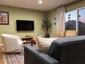 Living room. Ample seating to enjoy a movie with your friends and family. 