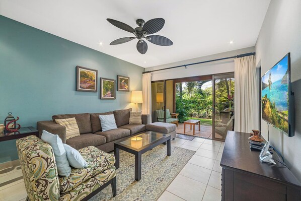 Living room with access to the patio.