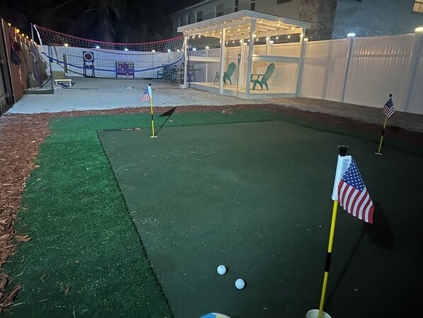 "Private putting green, sand court & lighted gazebo – fun & relaxing nights await!"