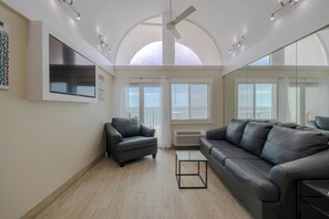 High ceilings Mirrors galore
built in Tv No Carpets