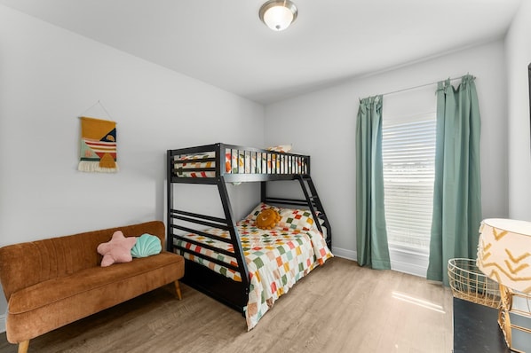 A kid-approved space with bunk beds and fun decor