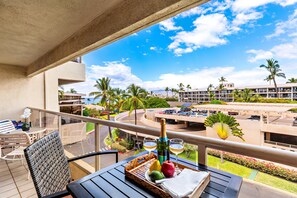 Balcony Views & Island Vibes. Enjoy stunning views and a refreshing drink on your private balcony. The perfect spot to unwind.