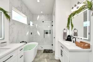 No need to choose between a hot bubble bath or a cool shower. This beautiful house got you covered.