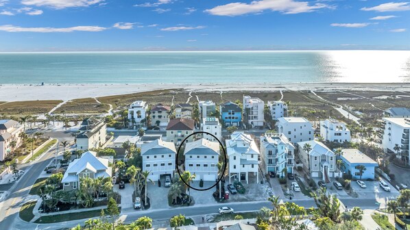 Aerial View.  Home is circled with the Gulf  in the background.