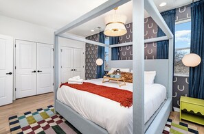 3rd Floor: Primary Bedroom featuring a King bed, Smart TV, large closet, and en-suite bathroom.