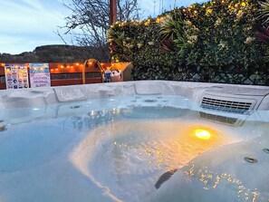 Secluded Hottub with flower wall | Floki’s Lodge, Felmoor Park, near Morpeth