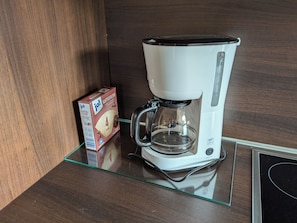 Kaffee und/oder Kaffeemaschine
