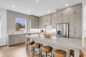 Large island for extra prep space or for company while you cook