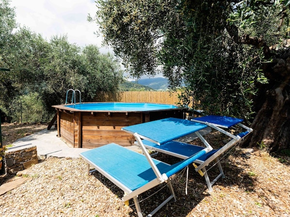 Blue, Furniture, Swimming Pool, Outdoor Furniture, Shade, Chair, Resort, Backyard, Wood Stain, Hardwood