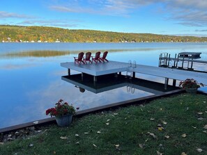 Calm waters, crisp air, and a floating dock that invites you to relax. Experience the beauty of all four seasons right here on the lake! 