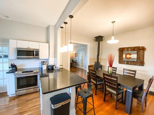 Cook your favorite meals in the stocked kitchen that comes with an electric stove, fridge, microwave. Essentials such as salt, pepper, cooking oil are provided.