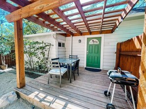 Enjoy the Colorado sunshine under the pergola lit by string lights