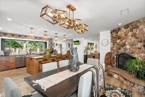 With an open view of the kitchen and living area, this dining space is as functional as it is inviting.