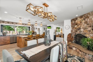 With an open view of the kitchen and living area, this dining space is as functional as it is inviting.