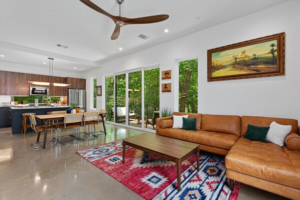 House #1: Open concept living room, dining room and kitchen. Great for entertaining!