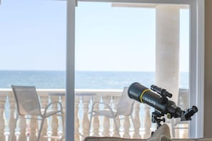 Ocean front balcony on second floor. Perfect for morning coffee with the sunrise and dolphin watching.