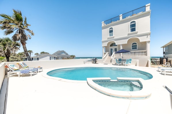 Pool and hot tub with ocean views. Spend your afternoon grilling and lounging.