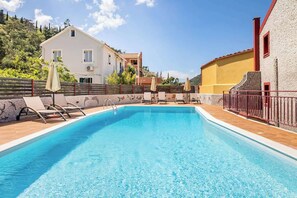 Outdoor shared swimming pool of the premises