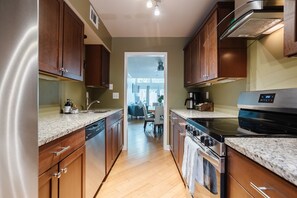 Full sized gallery kitchen with plenty of cabinet space