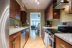 Full sized gallery kitchen with plenty of cabinet space