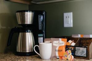 Whether you're fueling up before exploring the city or unwinding with a quiet cup, this little corner is designed with your comfort in mind