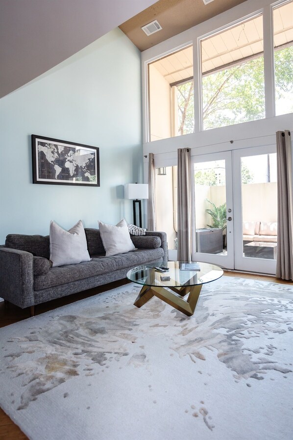 Historic charm meets modern comfort in this cozy gathering space with enclosed patio for extra outdoor living space