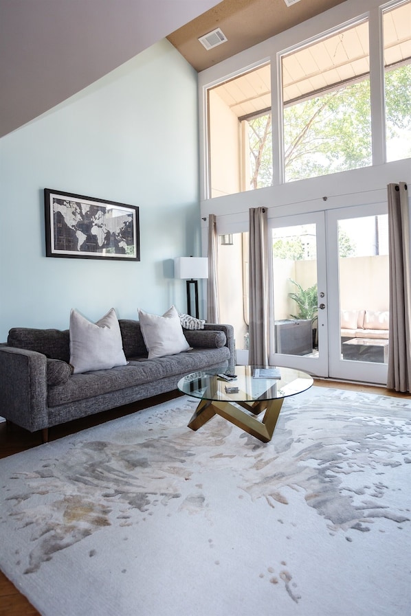 Historic charm meets modern comfort in this cozy gathering space with enclosed patio for extra outdoor living space