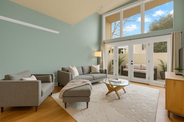 Historic charm meets modern comfort in this cozy gathering space with enclosed patio for extra outdoor living space
