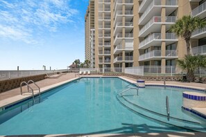 Great building amenities including outdoor pool.