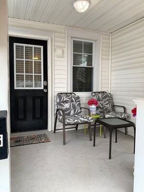 Charming front porch setup for enjoying the fresh Ocean City air