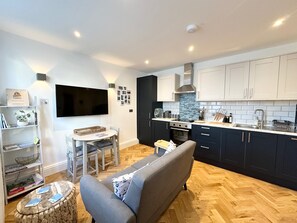 Open plan dining room, lounge and kitchen