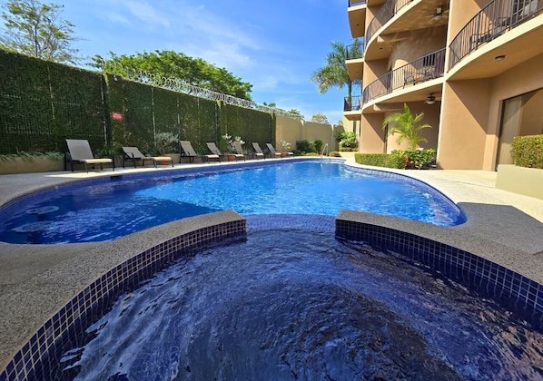 Enjoy easy poolside relaxation right outside your door.