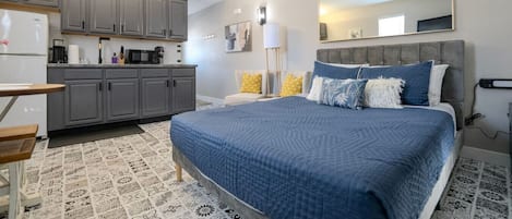 Queen Bed w/ memory foam mattress. Smart plugs w/ USB and USB-C plugs.