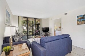 Comfortable living room with a peaceful outdoor view