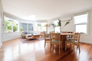 Spacious Sunroom with Garden Views, Open Floor Plan & Elegant Dining