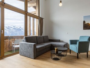 Flooring, Interior Design, Furniture, Floor, Wood, Wood Flooring, Living Room, Ceiling, Couch, Apartment