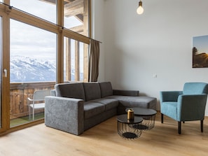Flooring, Interior Design, Furniture, Floor, Wood, Wood Flooring, Living Room, Ceiling, Couch, Apartment