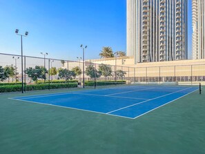 Tennis Court: Serve up some fun under the Dubai sun at our pristine courts! Game on!