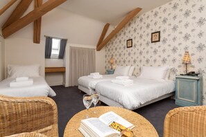 The second bedroom features 3 Single beds.