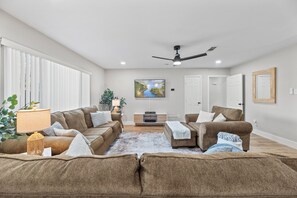 Relax on the comfy sofa, watch a movie, or play tunes on the Bluetooth speaker.