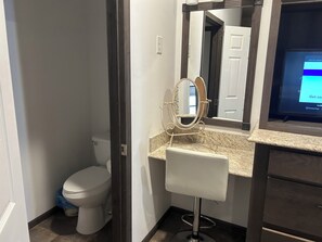 Master suite vanity and water closet for added privacy
