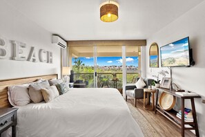 King-size bed with picturesque garden views