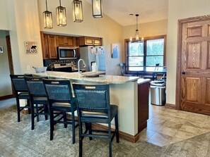 Cook up your favorites in the fully equipped kitchen with granite countertops, stainless steel appliances and eat-in dinette table