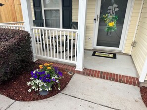 Front porch with rocking chairs