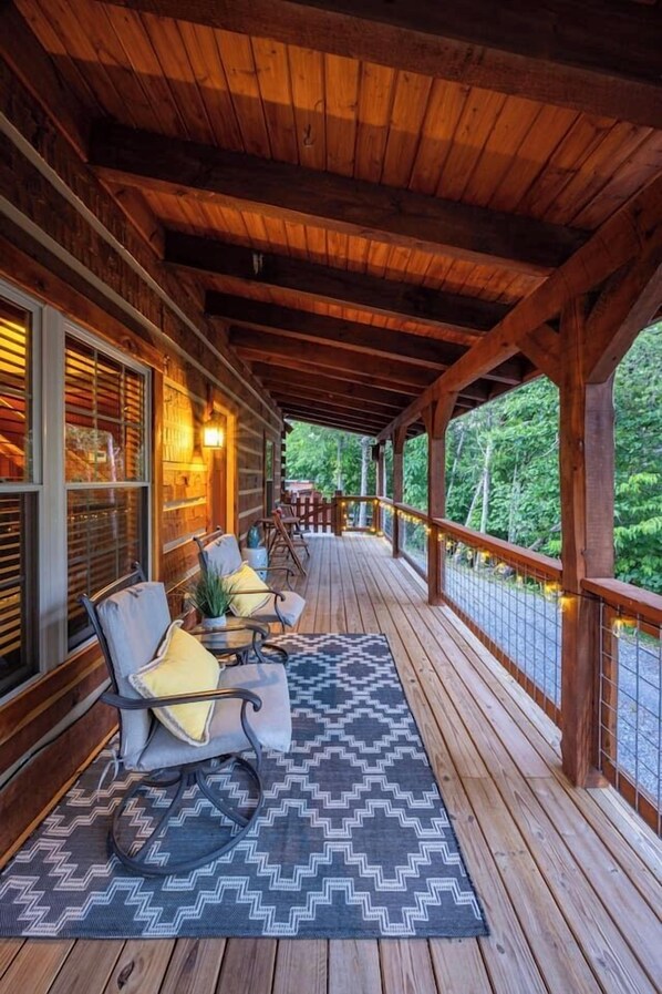 Savor your favorite beverage on our inviting front porch, ideal for laid-back relaxation.