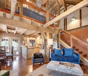 Our cabin offers a perfect retreat for couples, friends, or small families. Relax in the cozy living room, share meals at the dining table, or unwind in the loft w/ scenic views. Your stay promises serenity and cherished memories amidst tranquility.