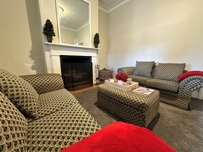 A timeless space warmed by both style and flame!