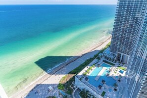 Sky-High Beachfront Penthouse: Stunning Views + Pool & Gym (7628)