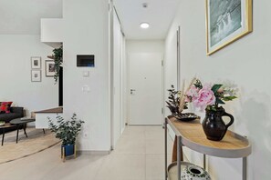  Spacious Entryway – A bright hallway with modern touches welcomes you into your stylish Gasperich retreat.